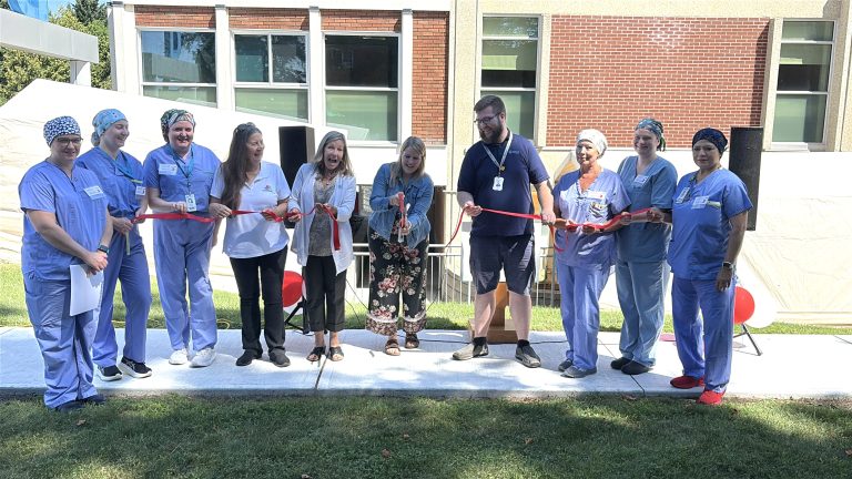 Members of the ARH OR Team, Arnprior and McNab/Braeside council members, and Chair of the ARH Board of Directors cut the ribbon to mark the completion of the Scope For Hope Endoscopy Campaign.
