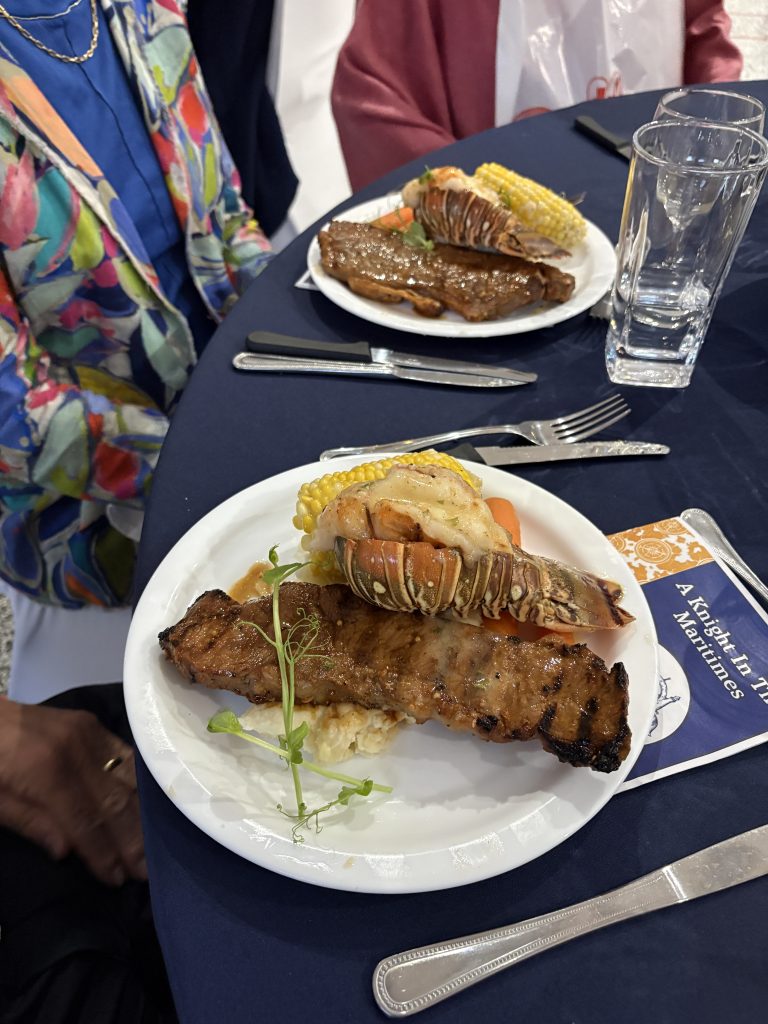 A delicious lobster and steak dinner